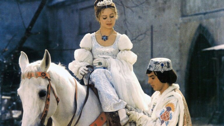 Cinderella on a horse talks to the prince