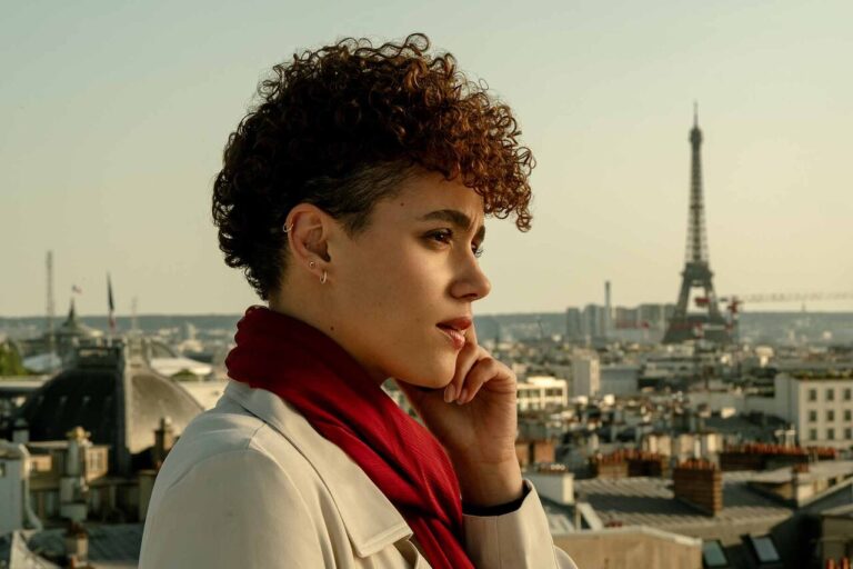 Nathalie Emmanuel with the Eiffel Tower in the background