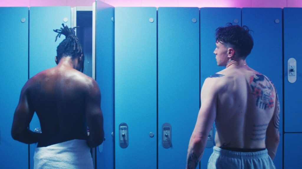 Jules and Preston in the changing room at the gay sauna
