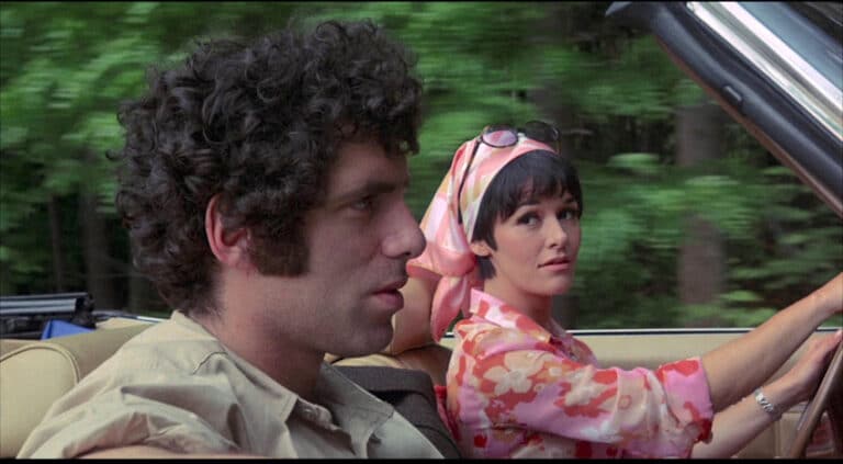 Elliott Gould and Marcia Rodd in a car