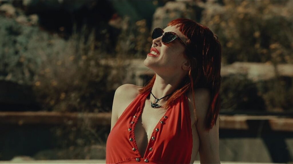 Sophie in her red halter top