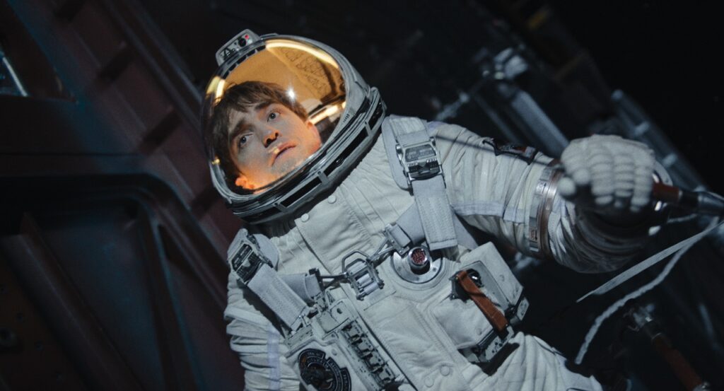 Mickey floating in a spacesuit