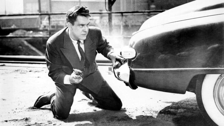 Frank with gun in hand