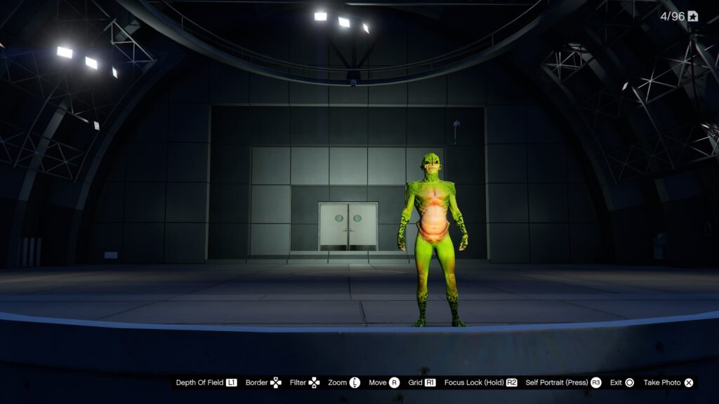 A green alien on stage in Hamlet