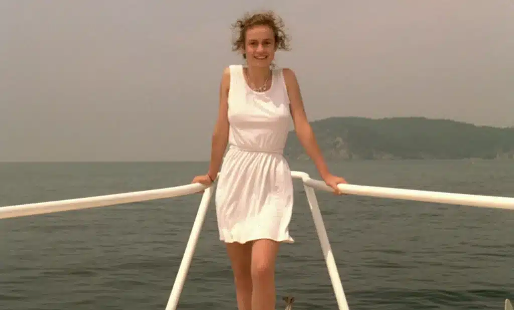 Suzanne in a white dress
