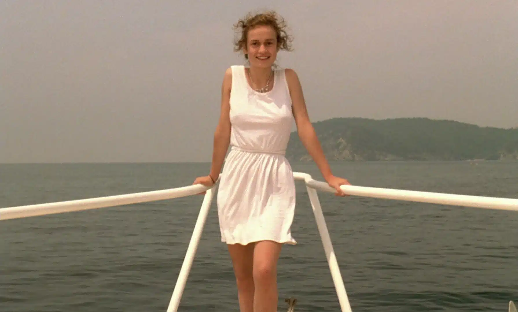 Suzanne in a white dress