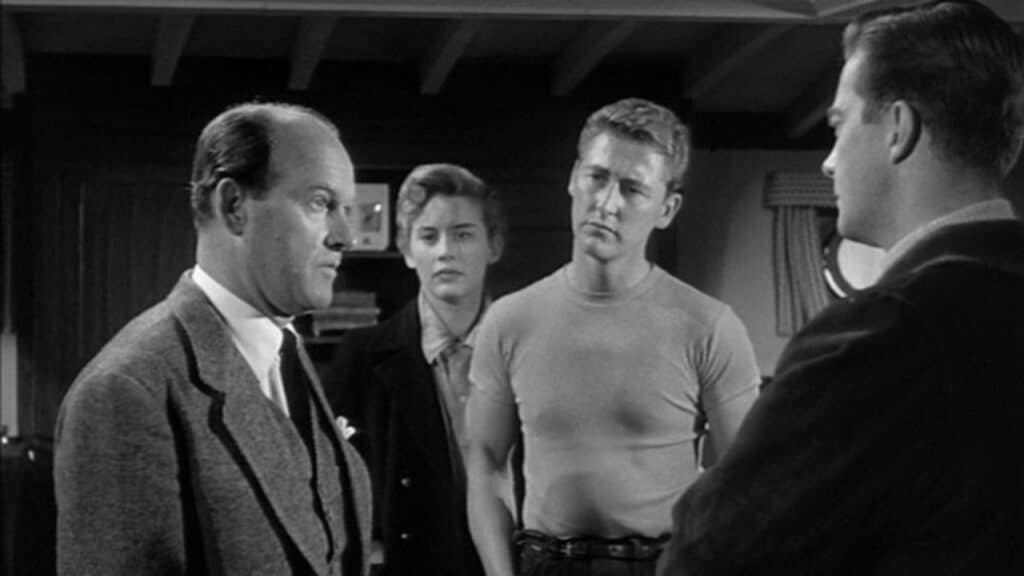 A policeman questions Joan, John and Peter