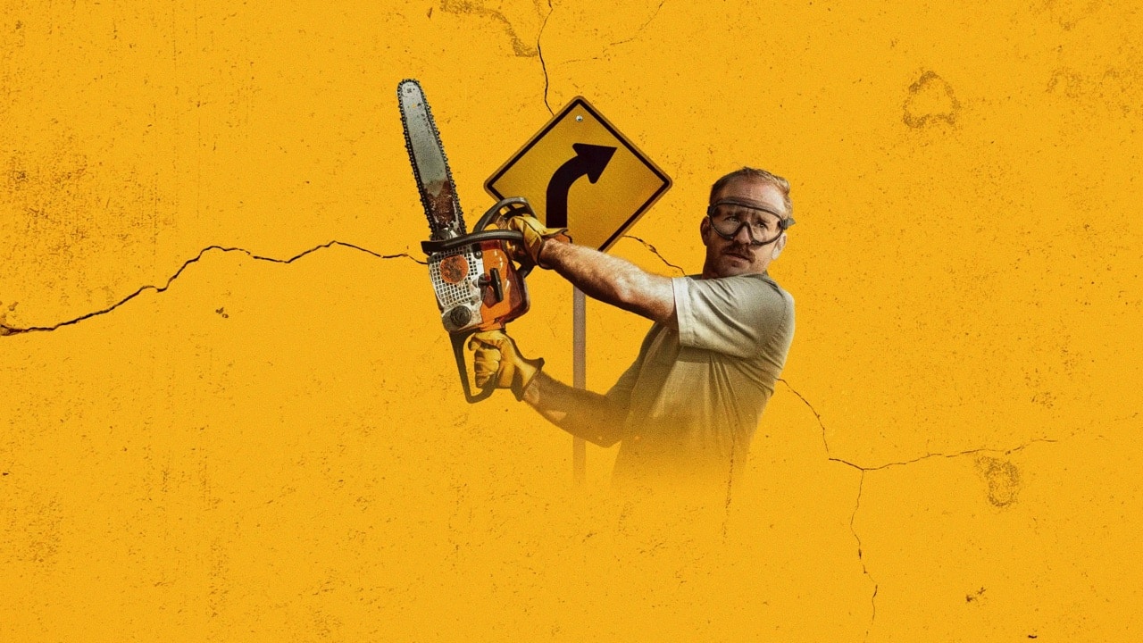 Josh with chainsaw