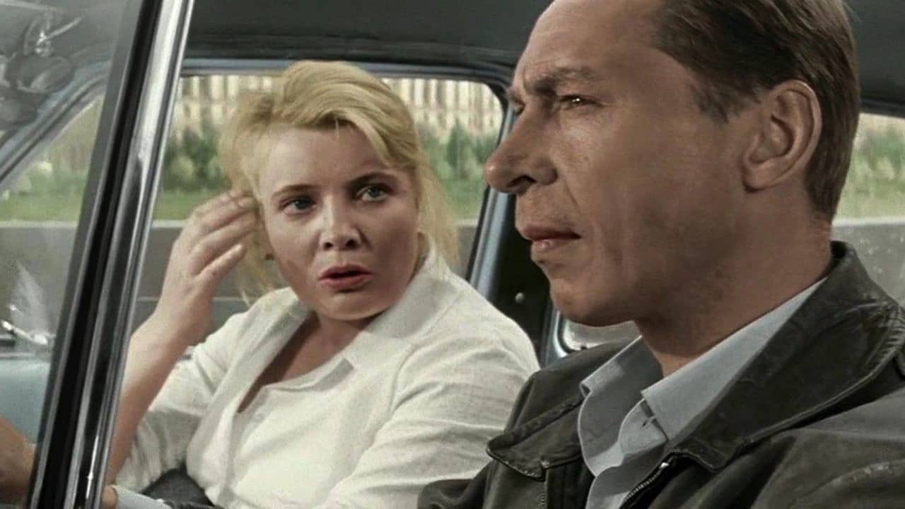 Nyura and Sasha in the taxi