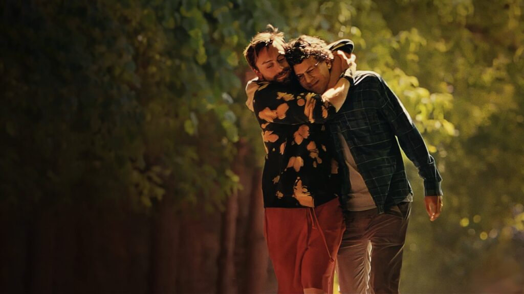 Benji hugging David's head