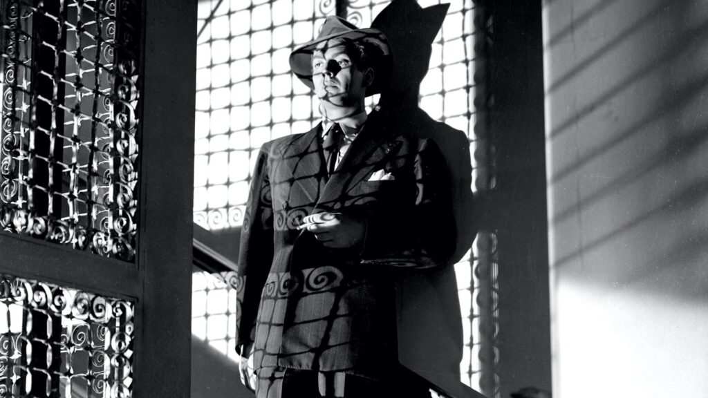 Victor Mature shot in stark direct lighting with shadows