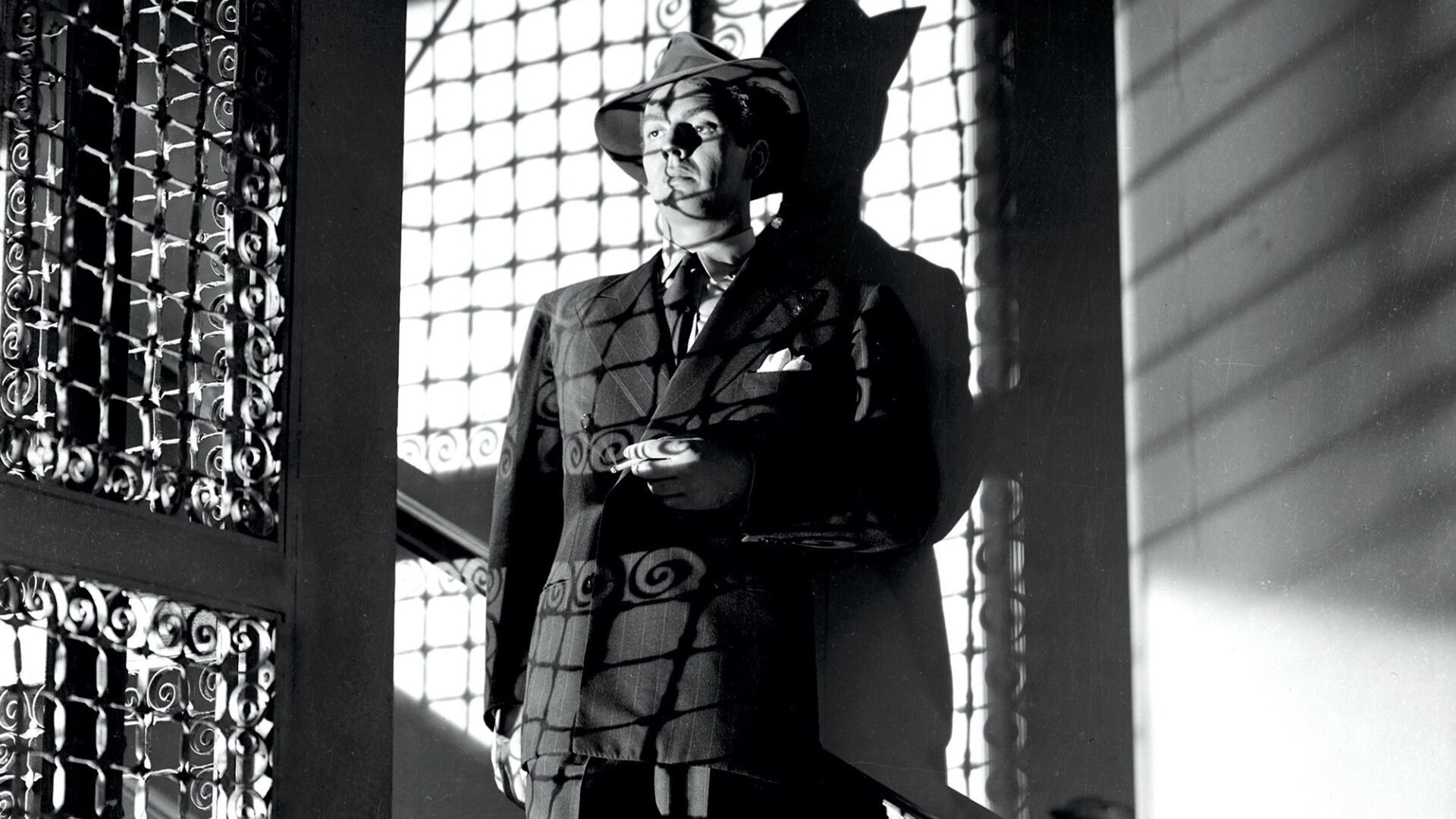 Victor Mature shot in stark direct lighting with shadows