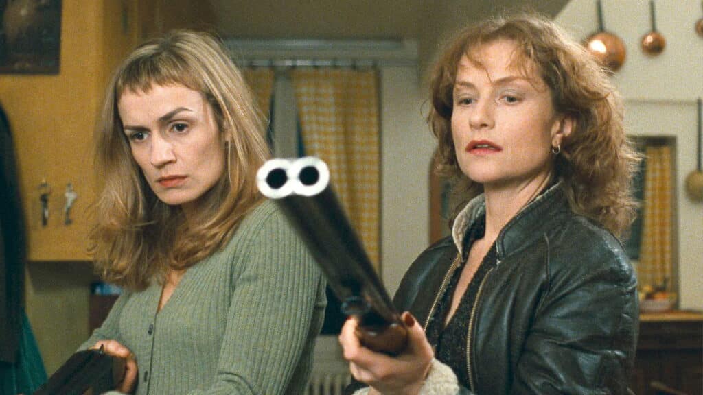 Sophie and Jeanne with shotguns