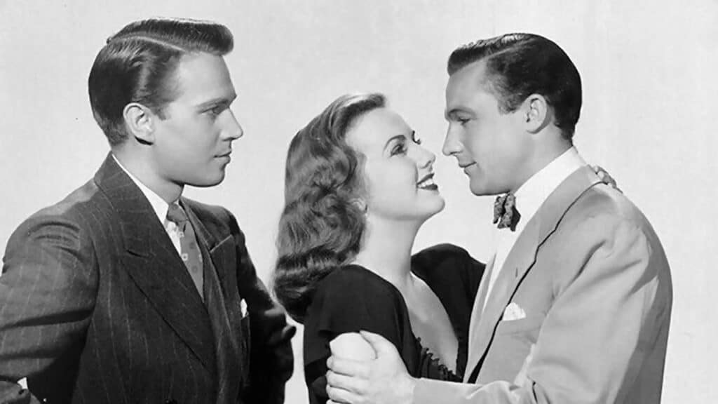 A publicity shot of Charles Harens, Deanna Durbin and Gene Kelly