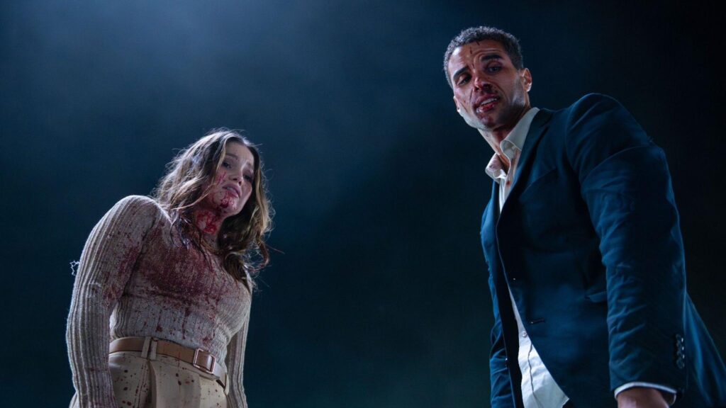 A blood-spattered Ally and Jay