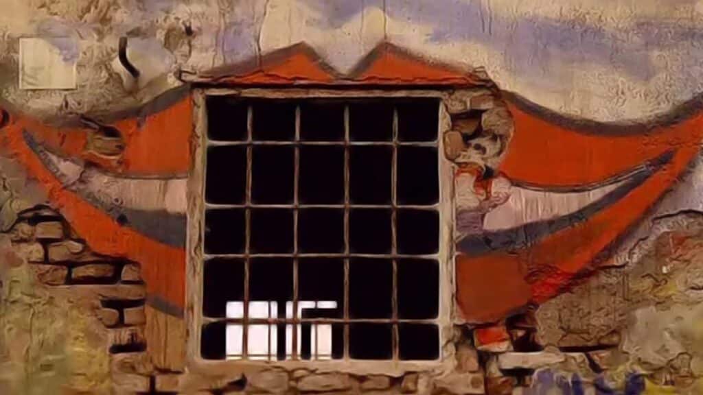 A house with a laughing mouth drawn around a window