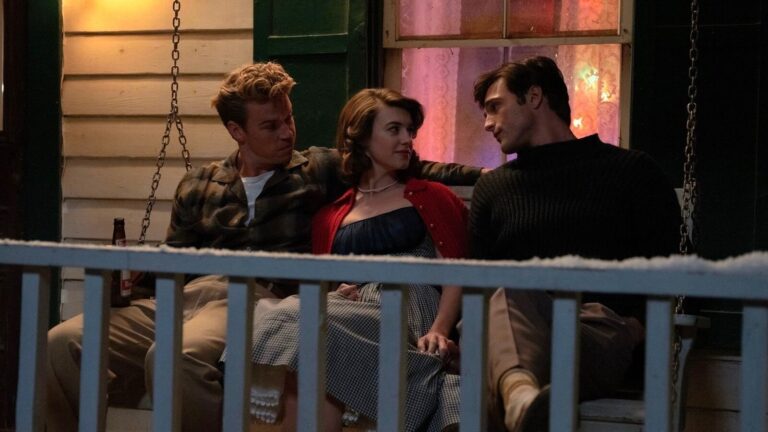 Lee, Muriel and Julius on a swing seat