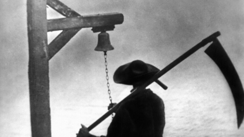 A shadowy figure with a large scythe