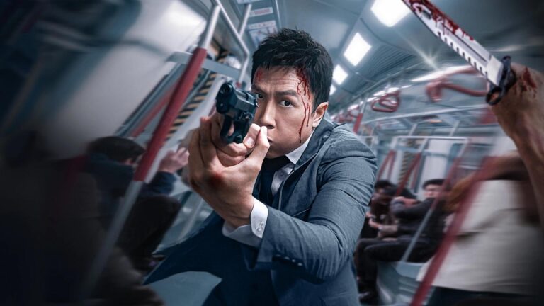 Donnie Yen with a gun