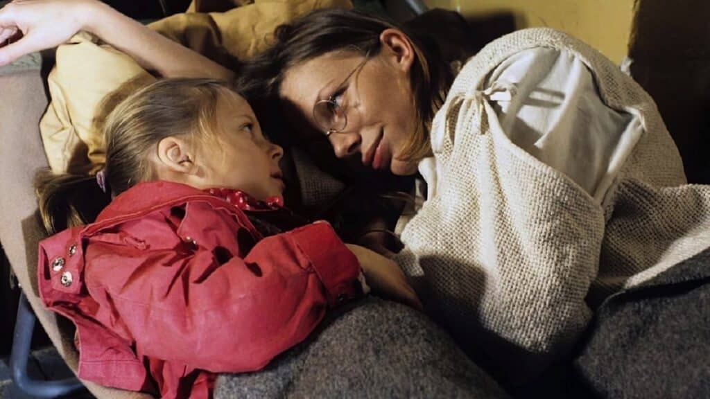 A daughter and her mother stare into each other's eyes in Dekalog Seven