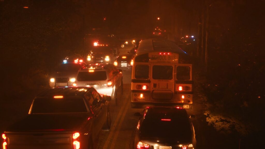 The bus caught in traffic as the fire approaches