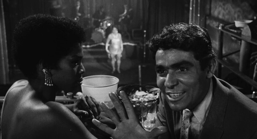 Jesus Otiz at a club with his black girlfriend