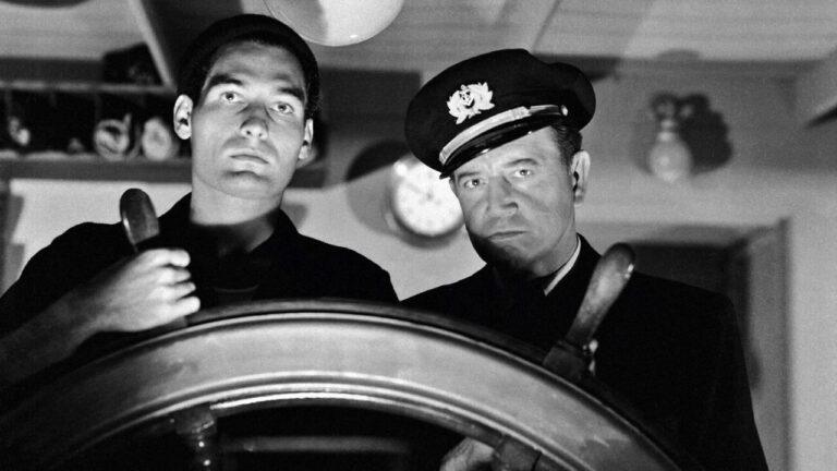 Tom Merriam on the bridge with Captain Stone