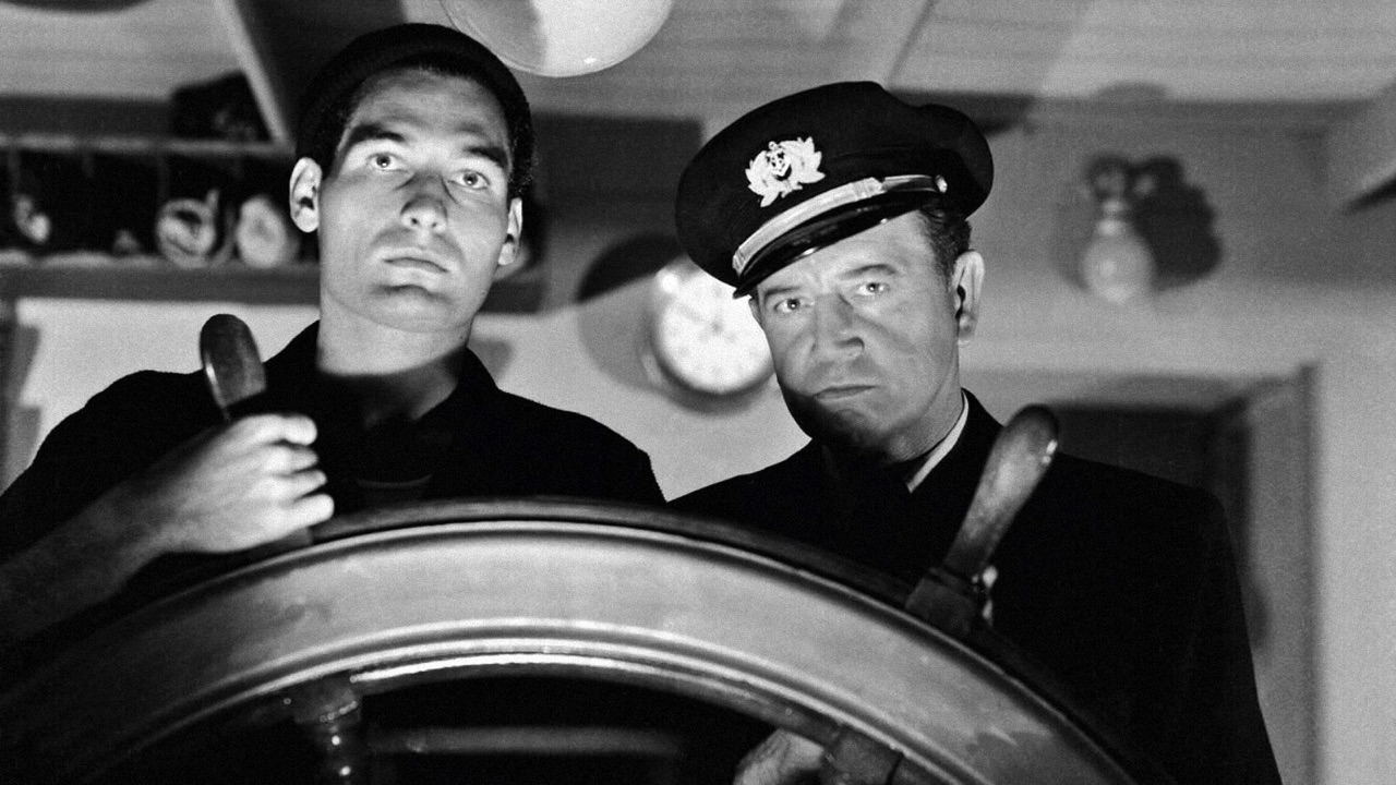 Tom Merriam on the bridge with Captain Stone