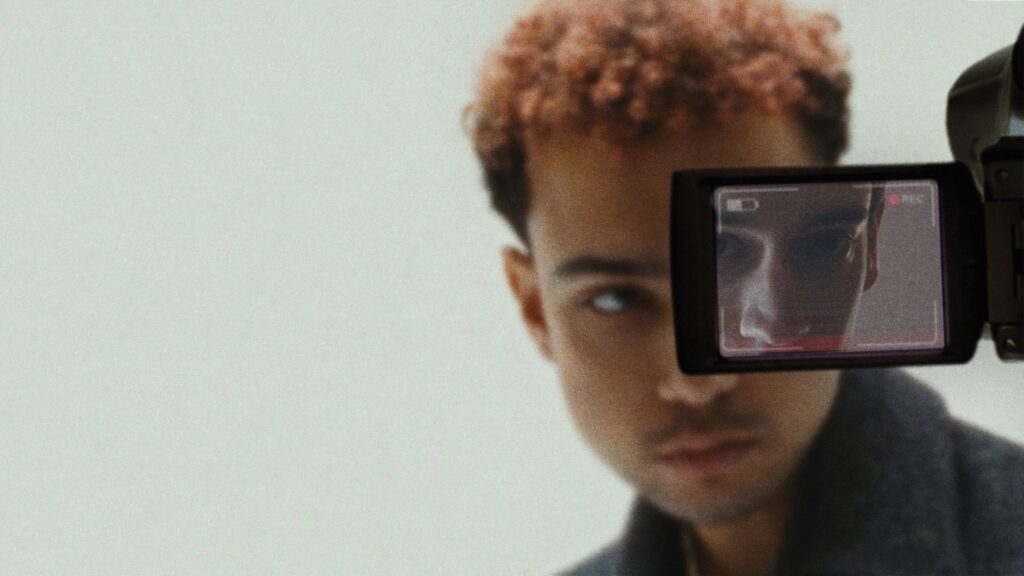 Archie with a camcorder