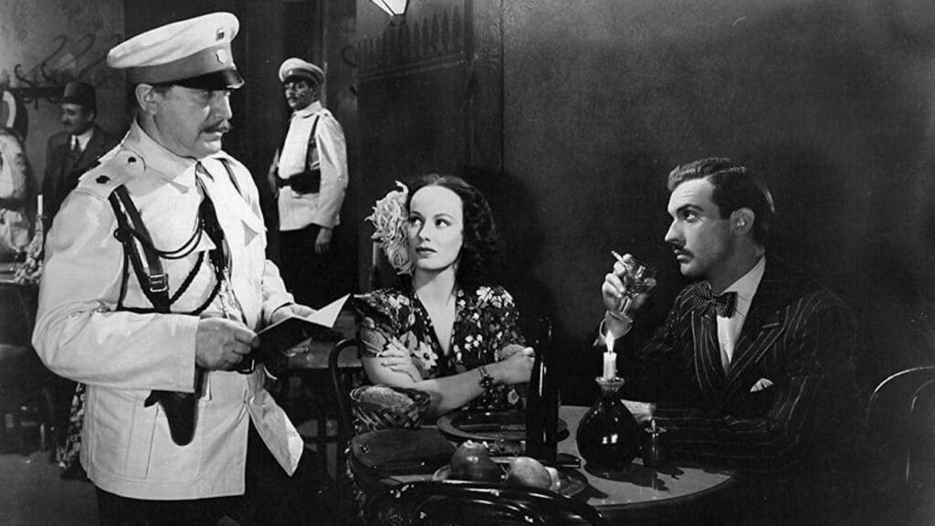 Louis Mercier, Faye Emerson and Zachary Scott at a nightclub table