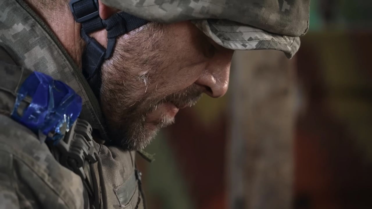 A soldier look downcast