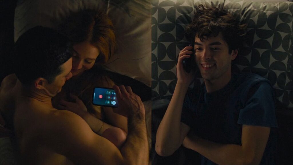 Rocky in bed with a girl while talking to Dennis on the phone