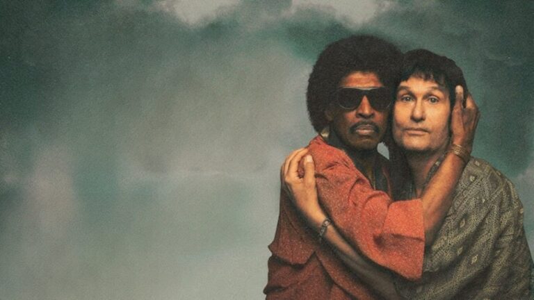 Stevie and Paul hug