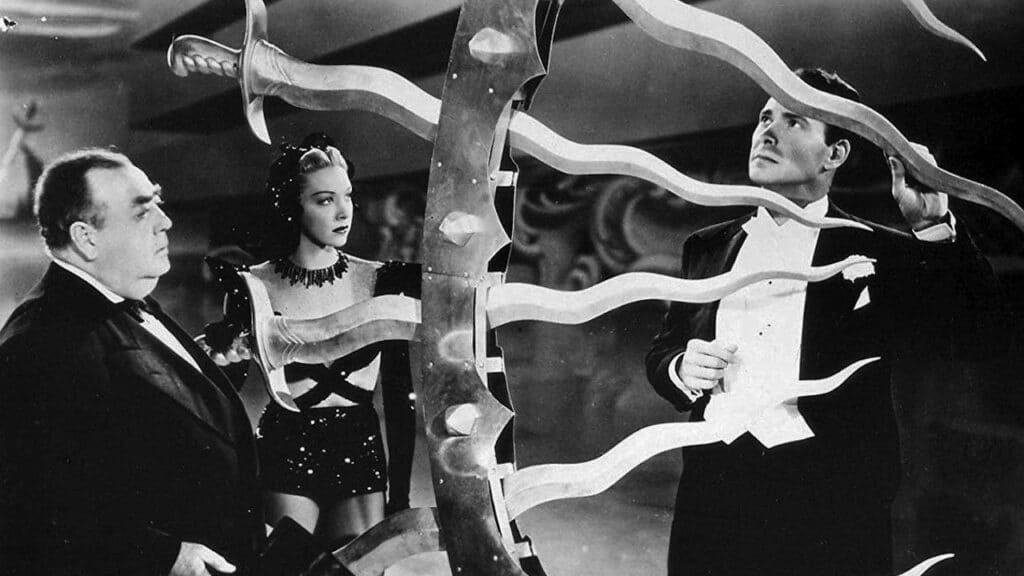 Harry, Roberta and Joe examine the "wheel of death" she'll later jump through