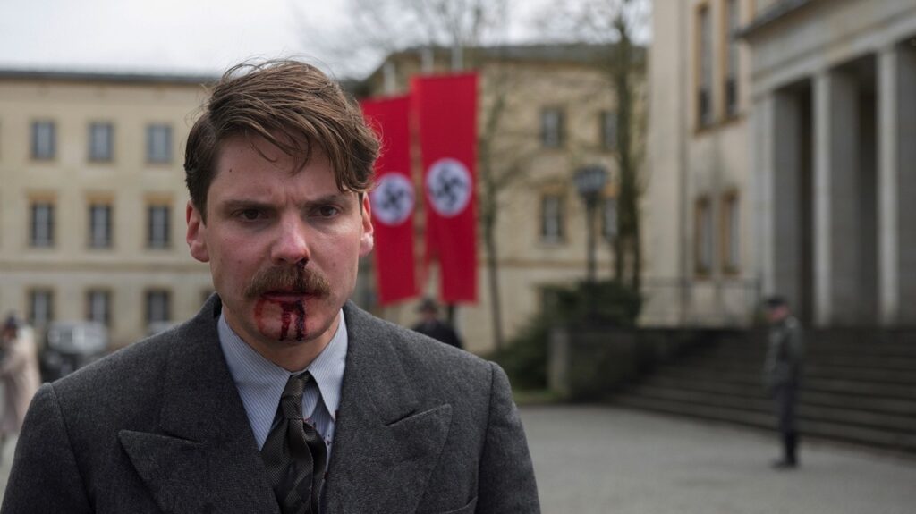 Inspector Escherich with a bloody nose