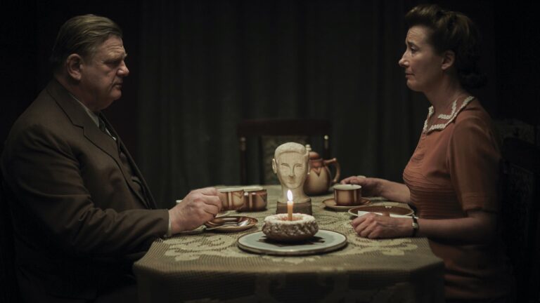 Otto and Anna Quangel face each other over the dinner table