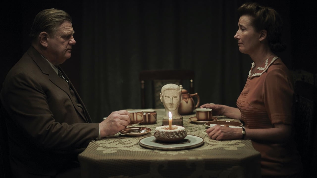 Otto and Anna Quangel face each other over the dinner table