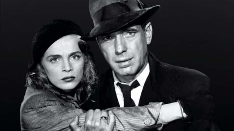 Lizabeth Scott and Humphrey Bogart stare straight into camera