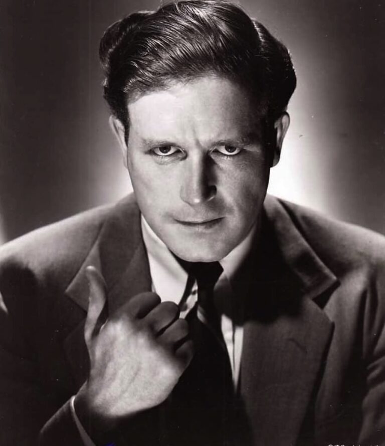 Lawrence Tierney in a publicity shot thumbing a lift