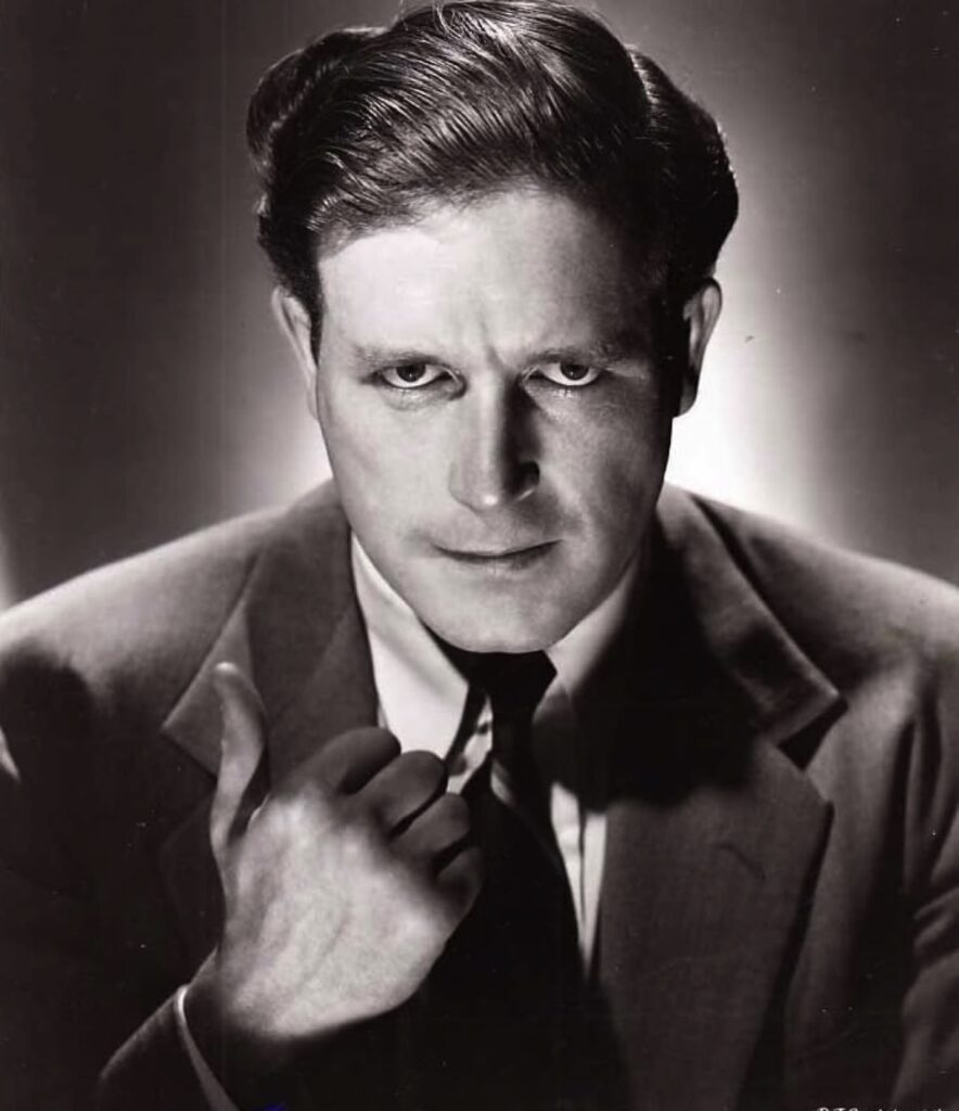 Lawrence Tierney in a publicity shot thumbing a lift