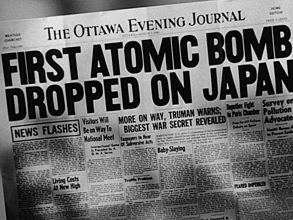 Newspaper headline about the dropping of the first atomic bomb on Japan
