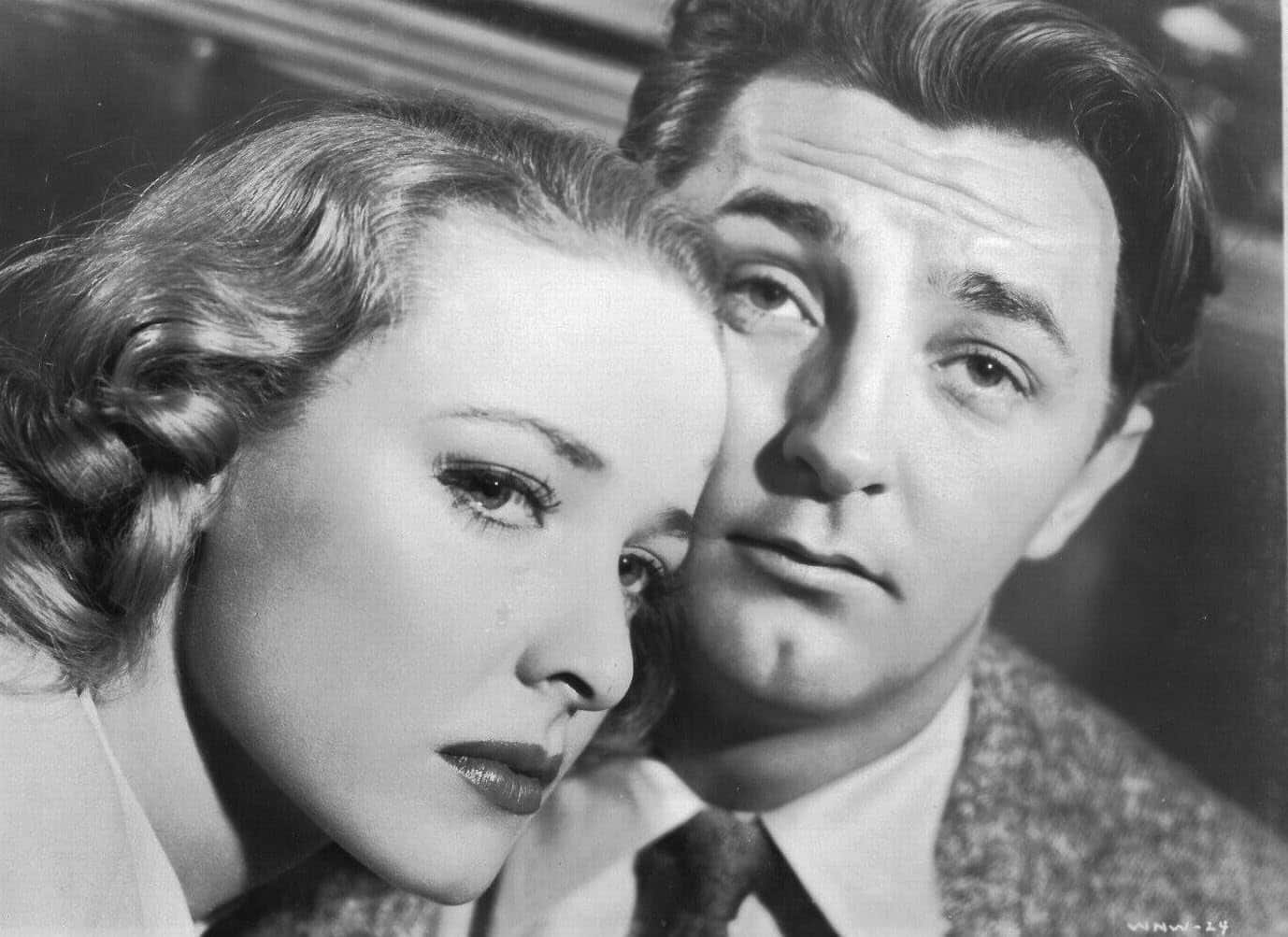 Laraine Day and Robert Mitchum head to head