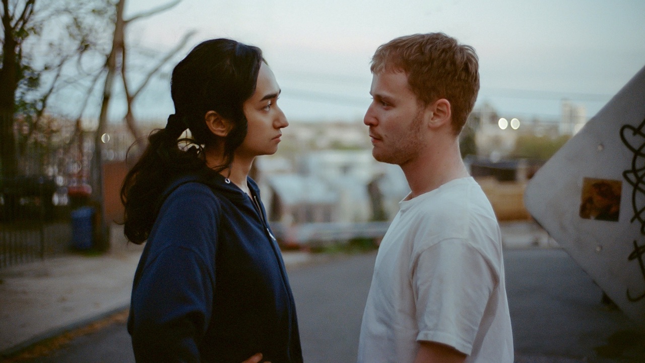 Aishe and Skinner stare at each other