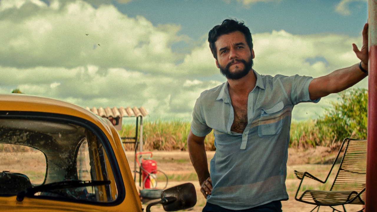 The secret agent by his yellow VW Beetle