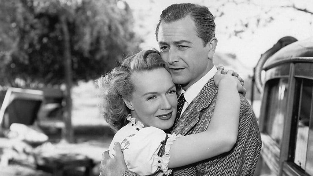 Mrs Ballantine holds on tight to her husband