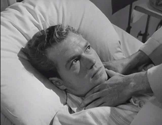 Jim Fletcher wakes up in a hospital bed with someone trying to strangle him