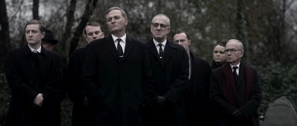 Finlay (front) and his henchmen