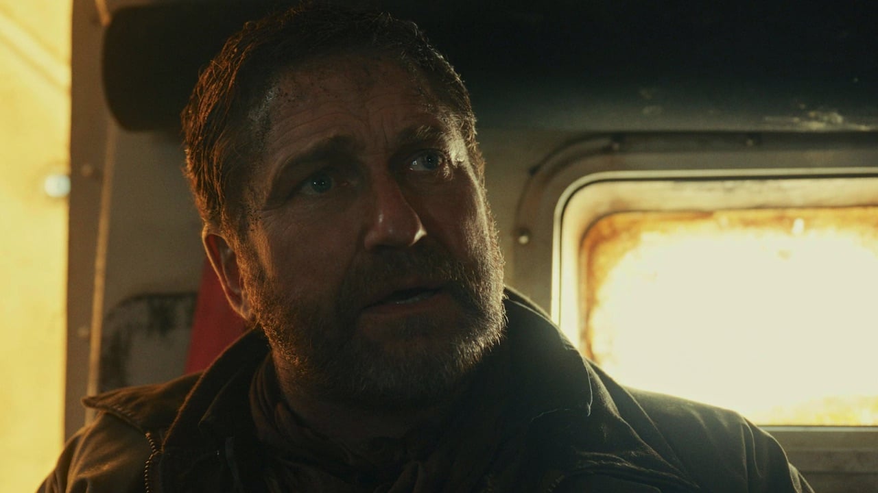 Close up of a bearded Gerard Butler
