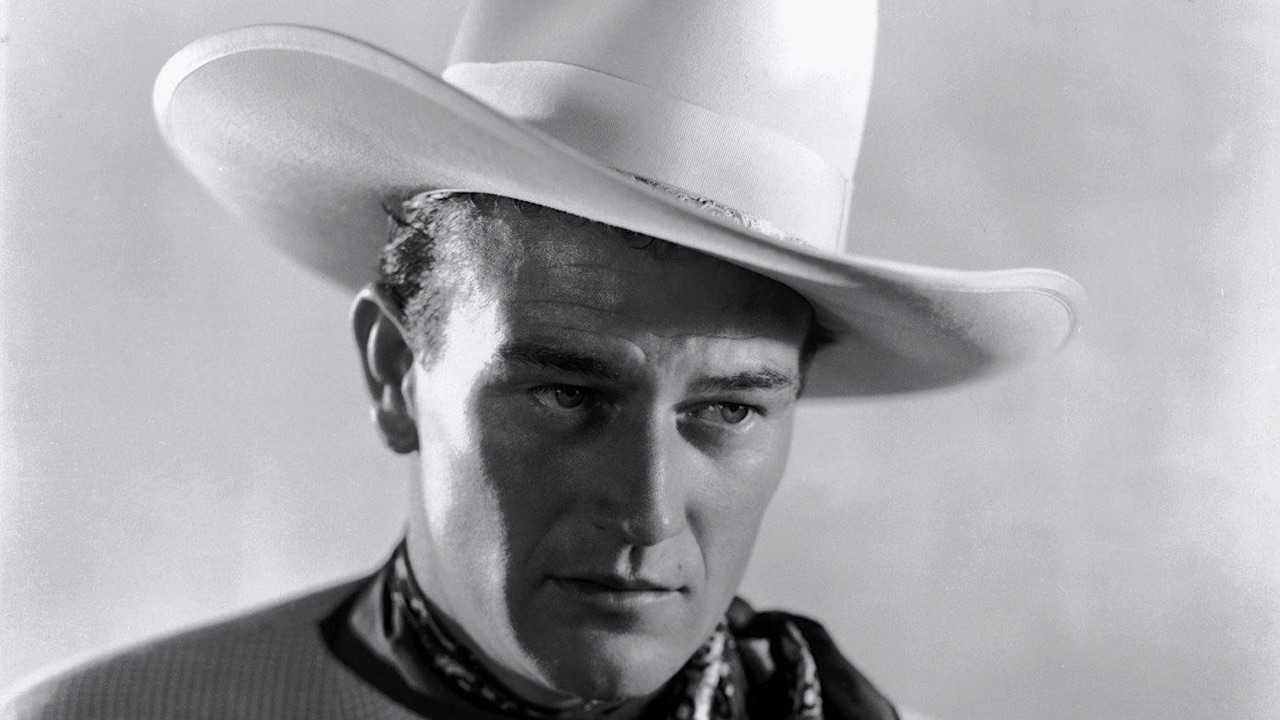 Head shot of John Wayne in white hat