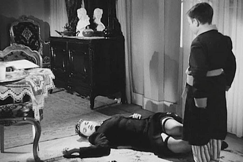 Young Archibaldo glimpses the stocking top of his dead governess